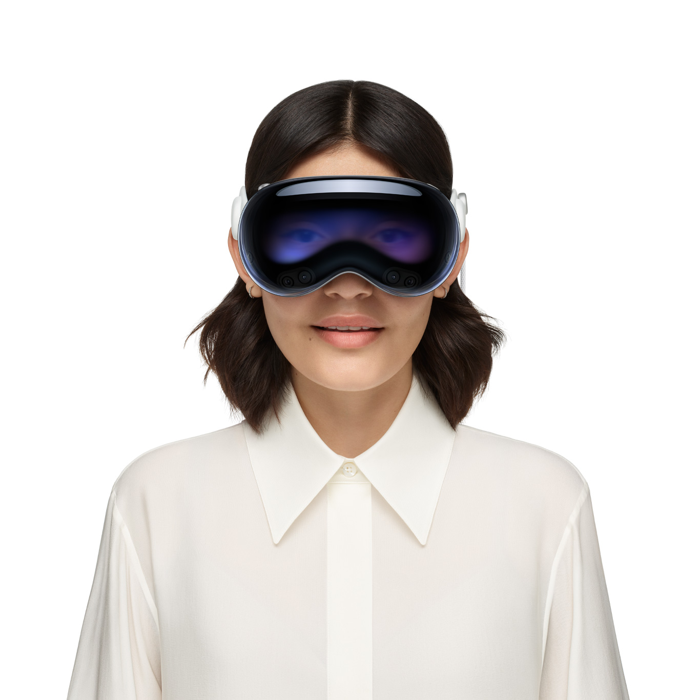 Person wearing Apple Vision Pro, with eyes revealed through an outward display