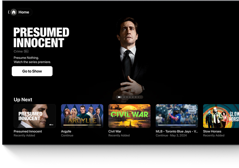 A flatscreen television showing the Apple TV app's home screen UI