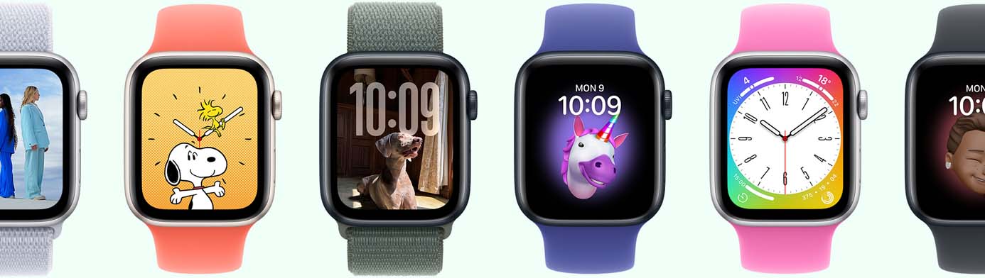Multiple Apple Watch devices showing various watch face options
