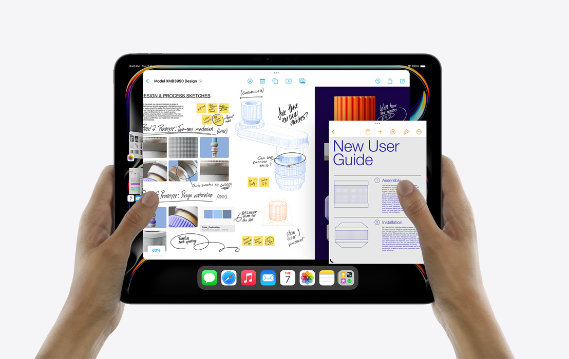 A pair of hands holding an iPad Pro showcasing  Stage Manager to multitask between Calendar, Freeform, Mail, Pages, and the Photos app.