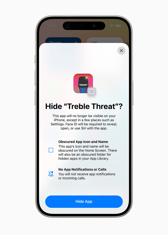 Treble Threatというアプリを非表示にするかどうか確認するプロンプトが画面に表示されているiPhone 15 Pro。