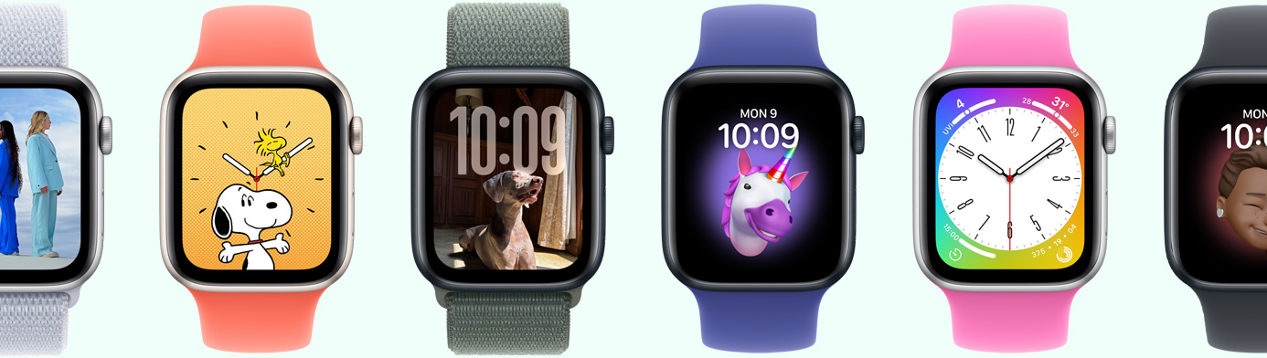 Multiple Apple Watch devices showing various watch face options