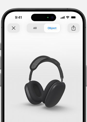 Obrázek vesmírně šedých AirPodů Max v zobrazení rozšířené reality na iPhonu.