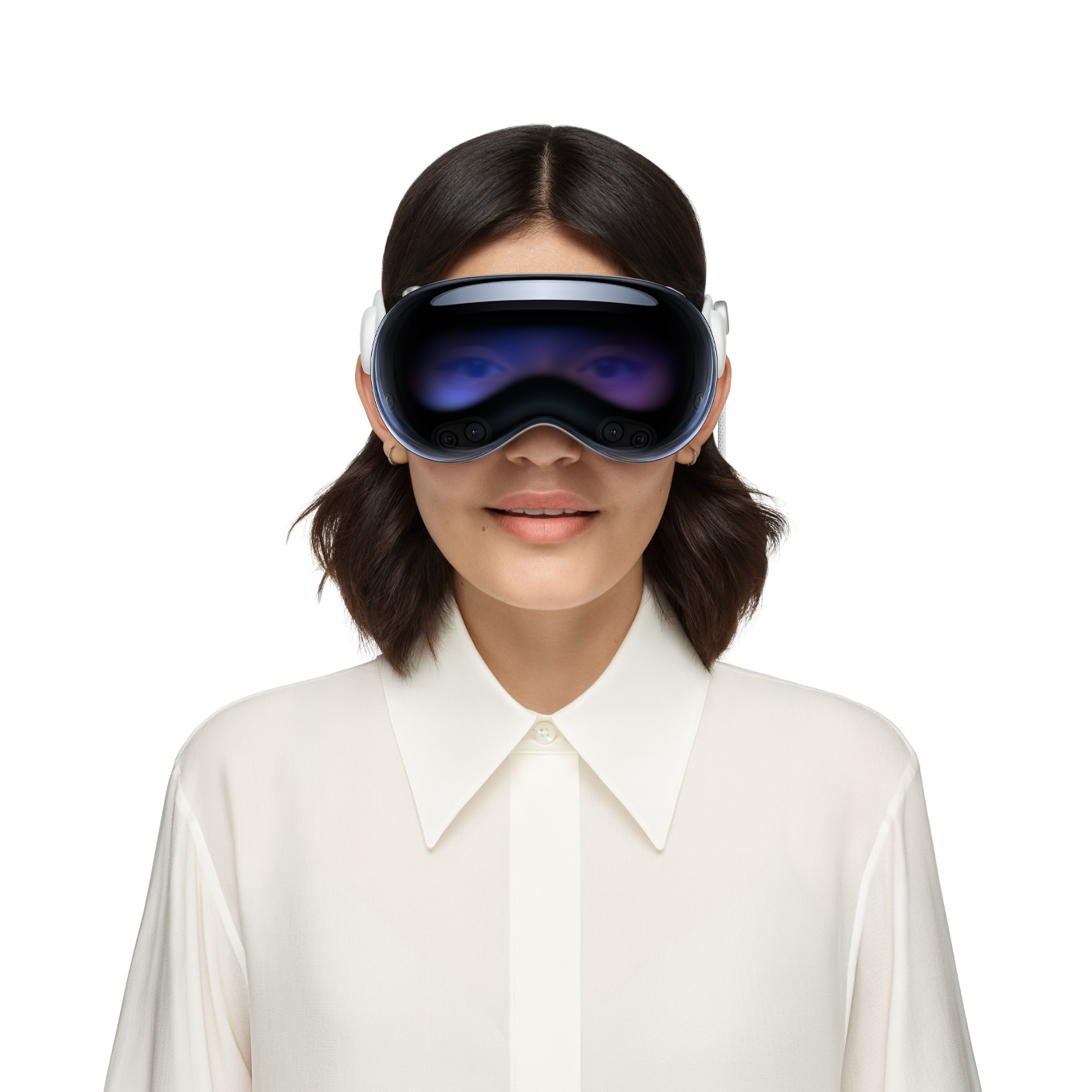 Person wearing Apple Vision Pro, with eyes revealed through an outward display