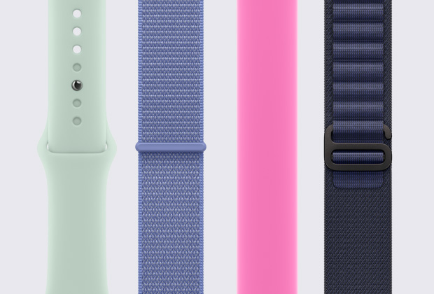 Quatre bracelets d’Apple Watch différents placés à la verticale l’un à côté de l’autre.