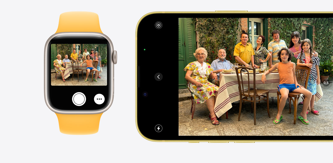 Một chiếc iPhone 15 đang mở chế độ chụp ảnh. Một chiếc Apple Watch Series 9 đang sử dụng tính năng Điều Khiển Từ Xa Camera để xem ảnh được chụp trên iPhone 15.
